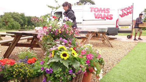 Tom's Vans Removals and Deliveries Bath delivering flower at a local event